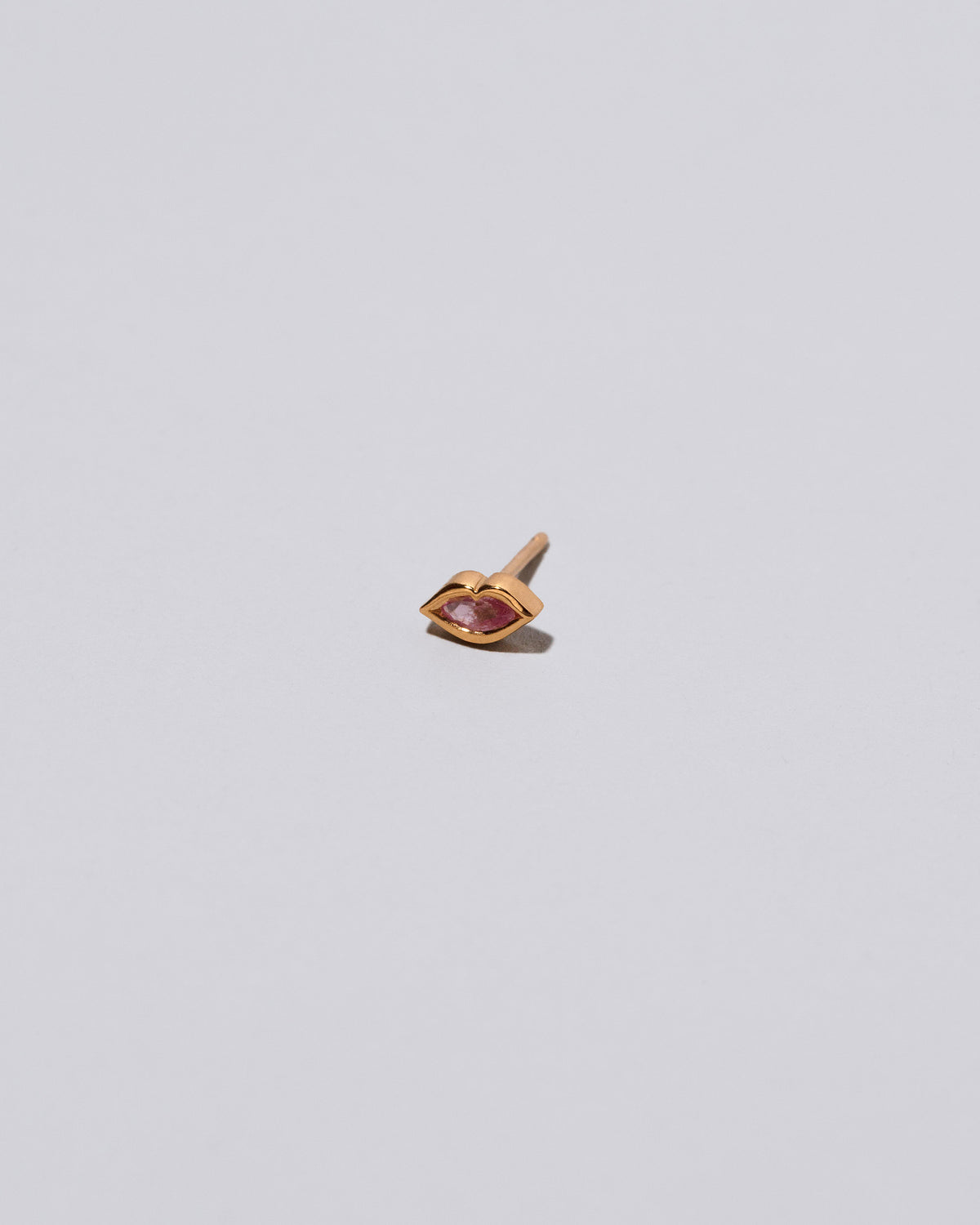Light Pink Sweet Little Kiss Stud Earring Single on light color background.