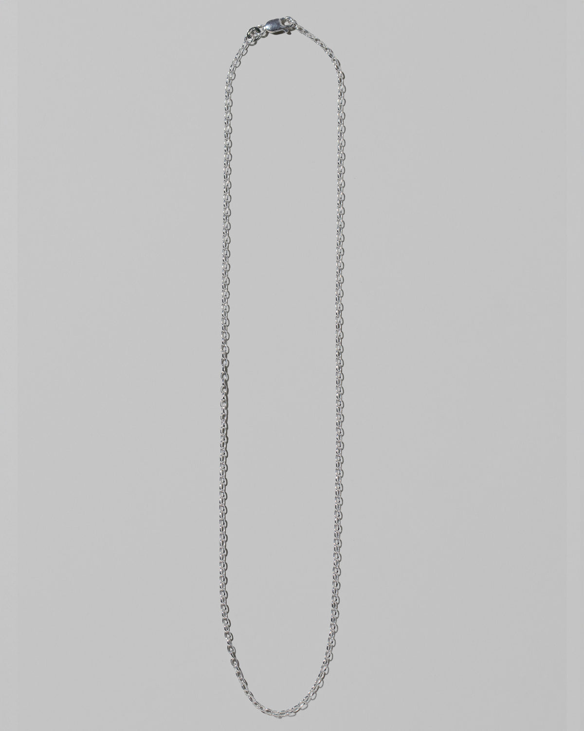 CRZM 2mm Sterling Silver Short Loop Chain Necklace on light color background.