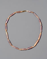 Blush Stick Pearl Strand Necklace on grey color background.