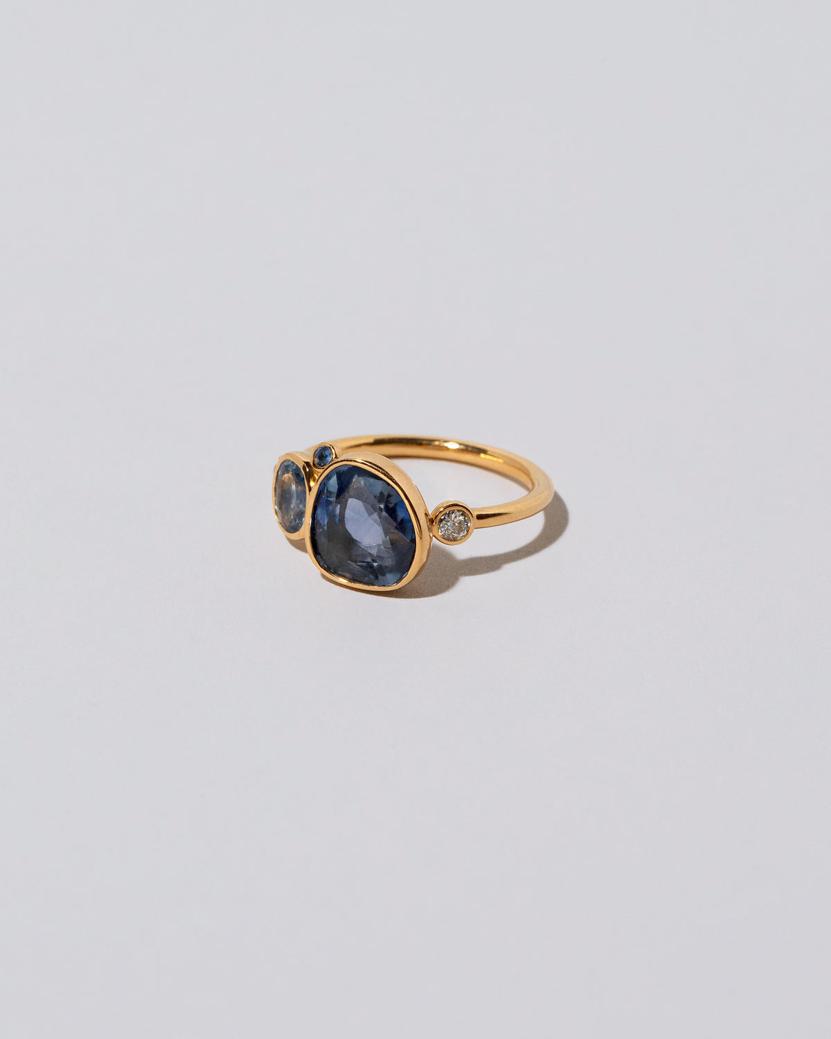 Oceania Ring on light color background.