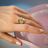 product_details::Gold Thin Level Band on model.