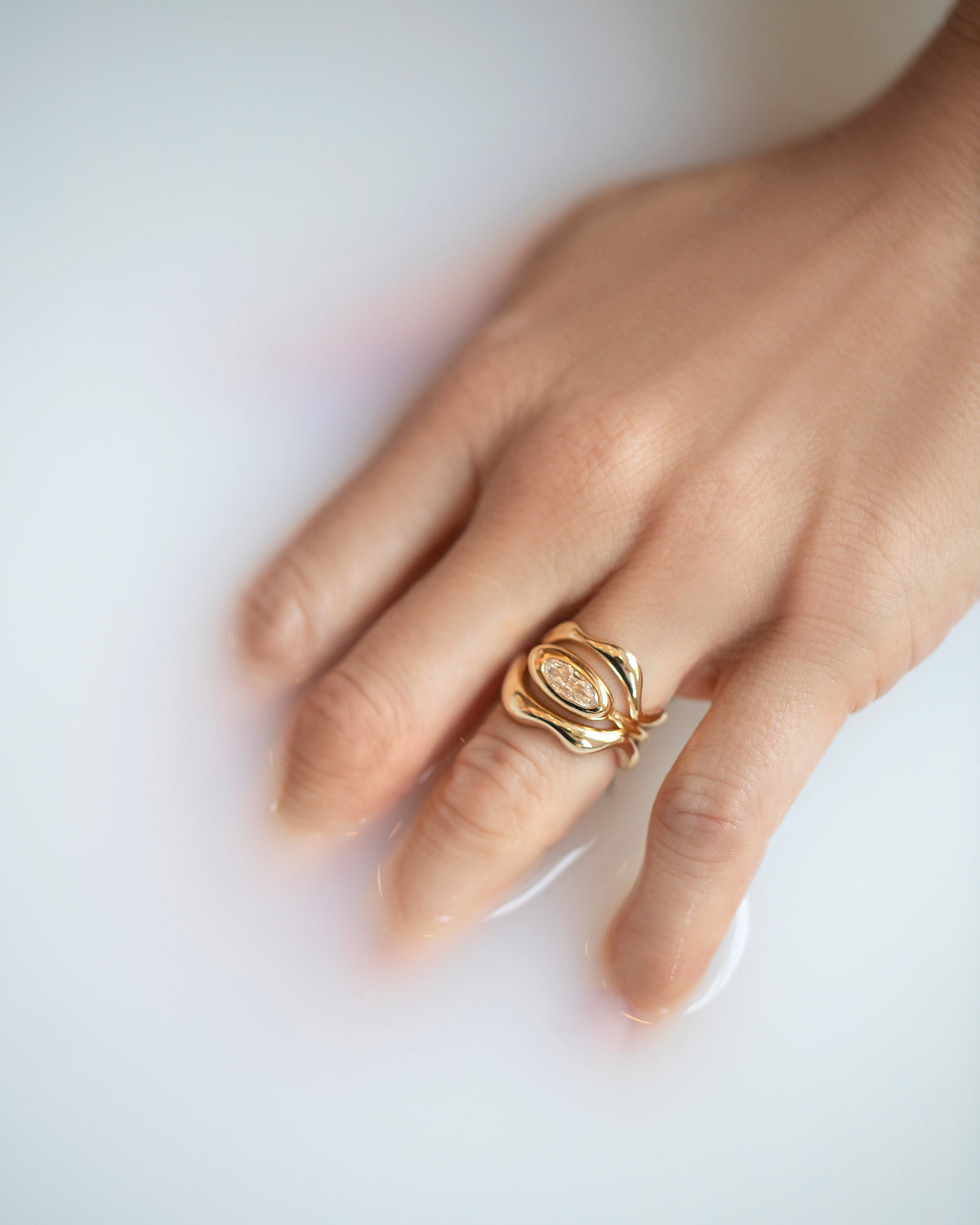 First edition of the Moval Diamond Equalize Ring on model.