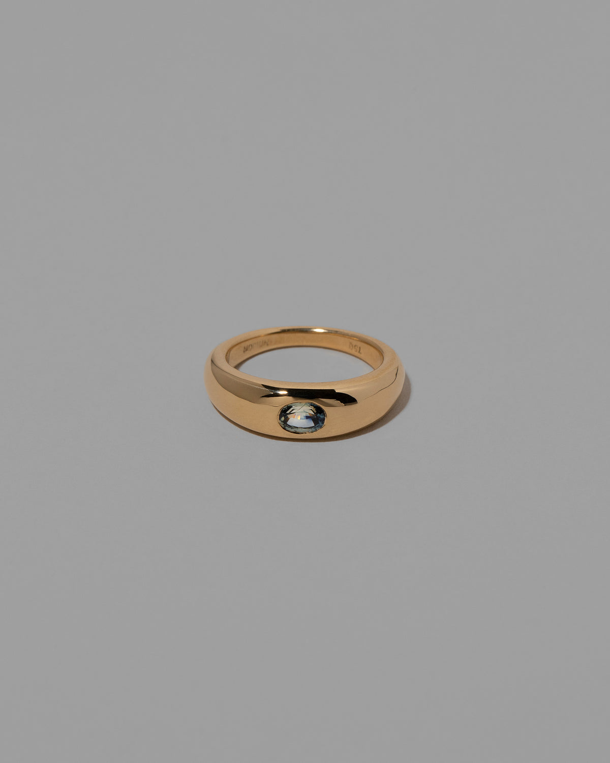 Sapphire Venus Ring on light color background.