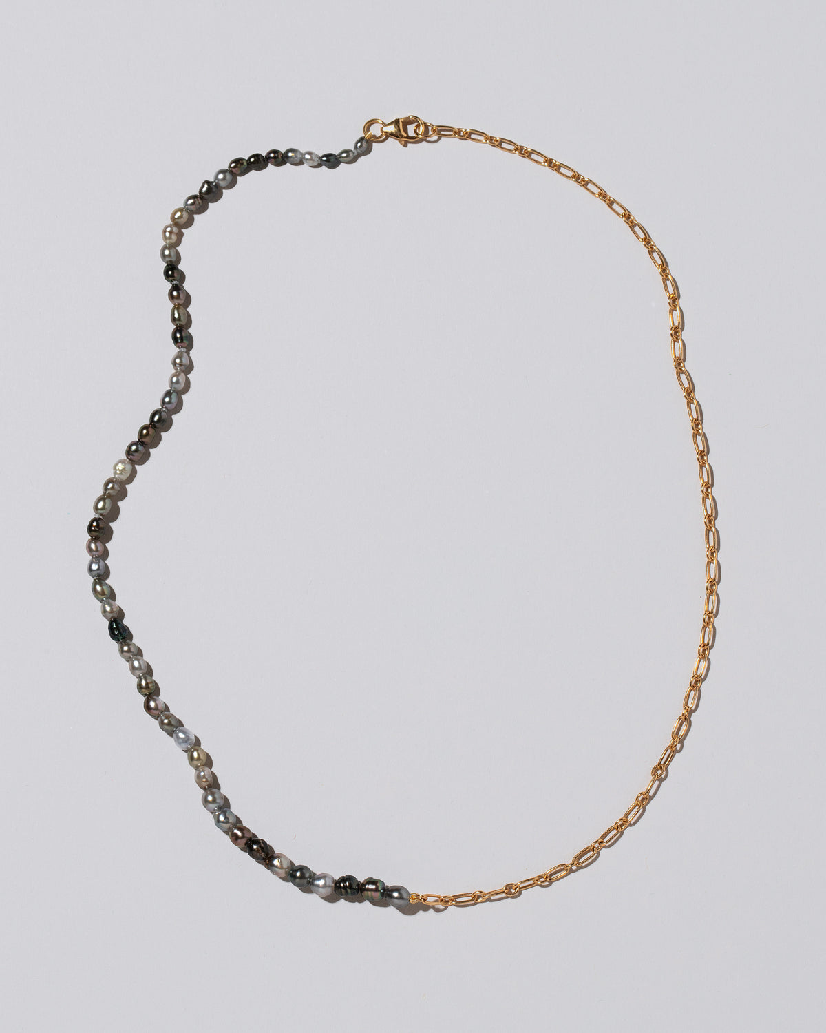 Tahitian Pearl Small Oval Necklace on light color background.