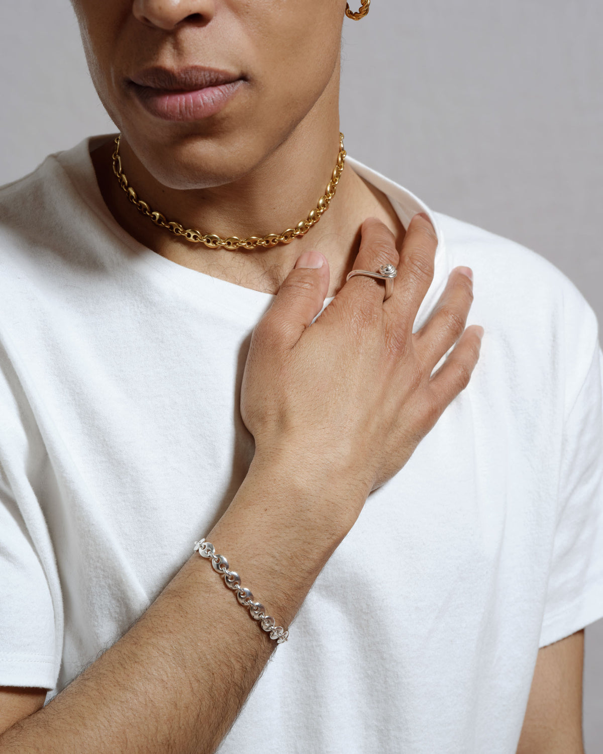 Styled image featuring CRZM jewelry on model.