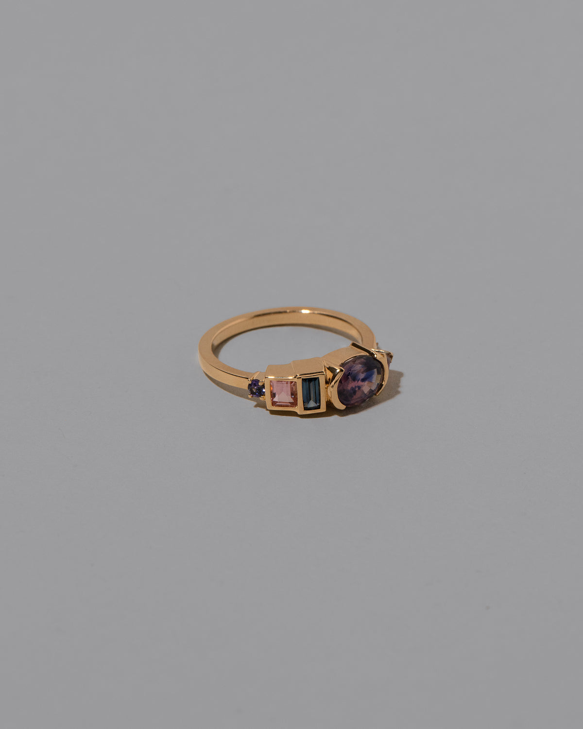 View from the side of the Scorpius Ring on light color background.