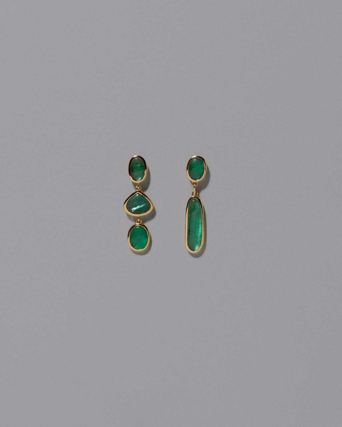 Eternal Life Earrings on light color background.