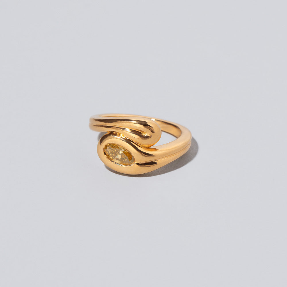product_details::Closeup details of the Fold It Ring on light color background.