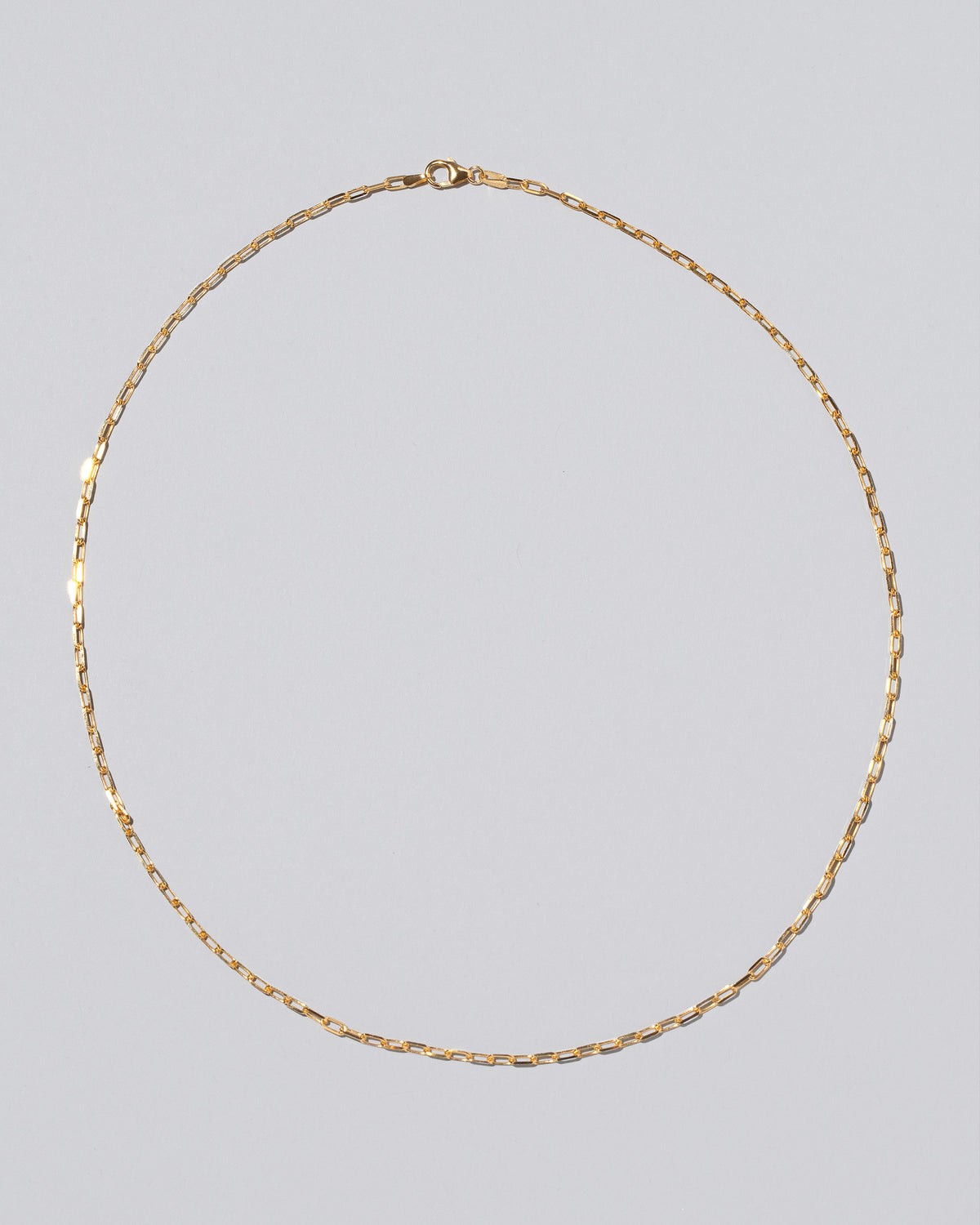 2.2mm Beveled Oval Chain Necklace on light color background.