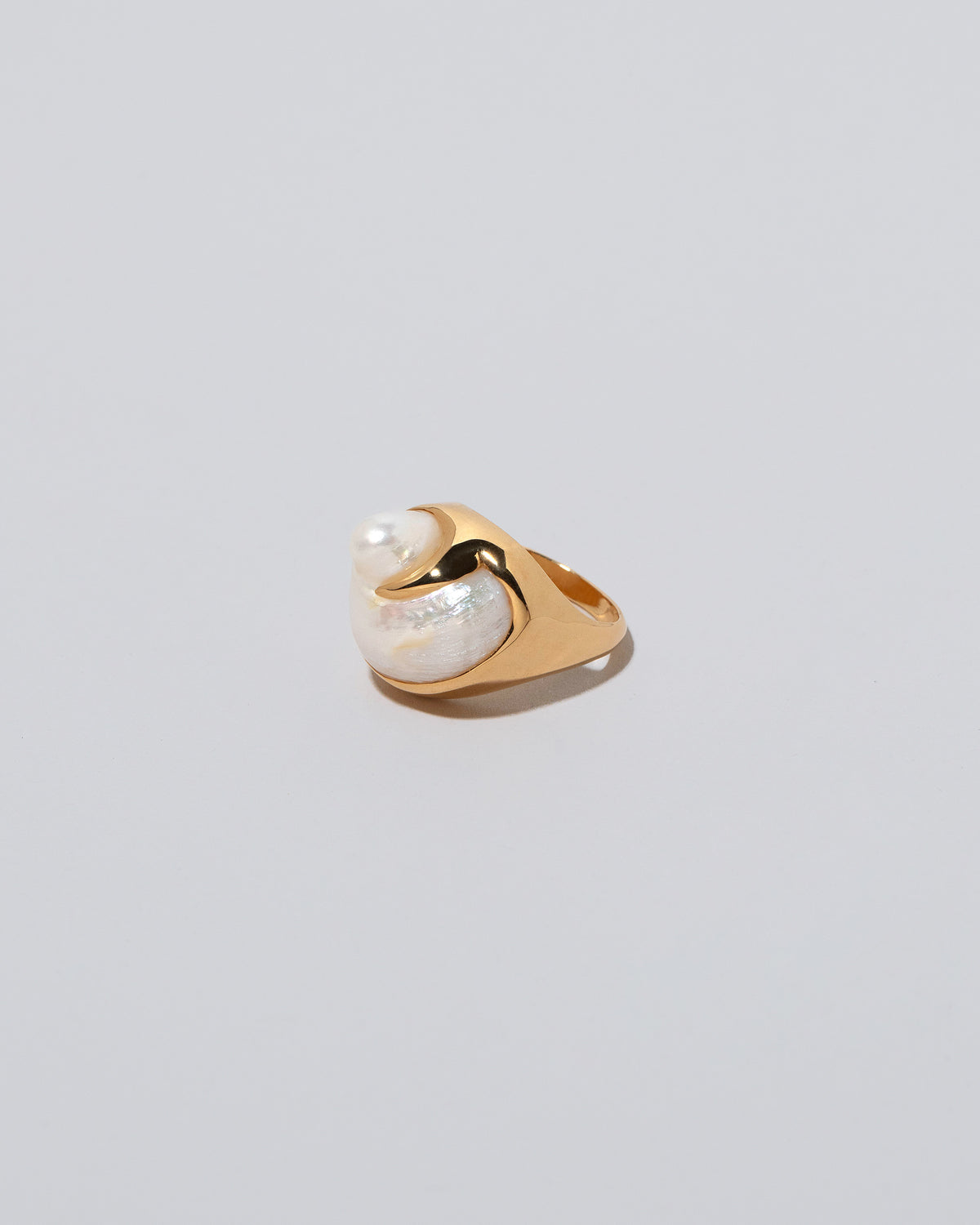 Ibis Pearl Ring on light color background.