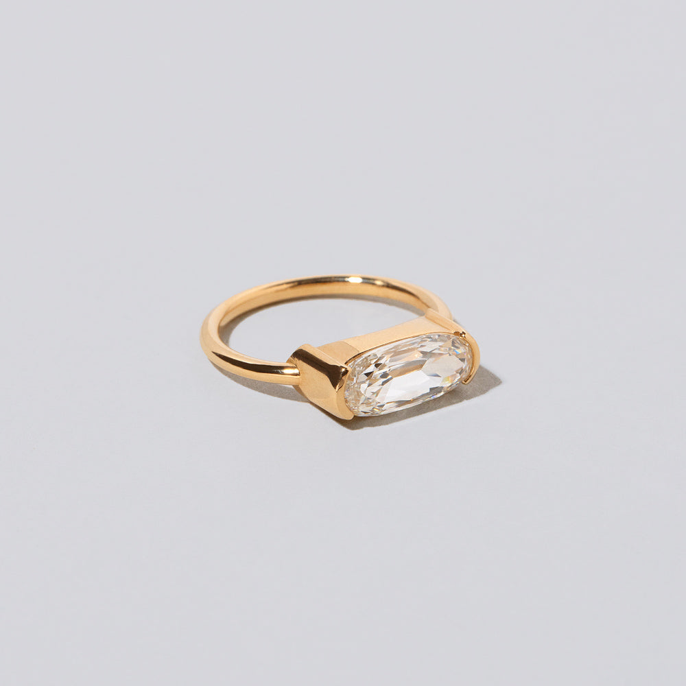 product_details::Closeup details of the Adrastea Ring on light color background.