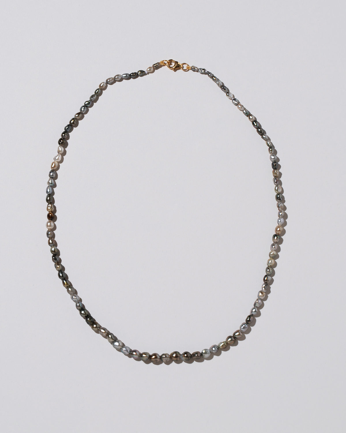 Tahitian Pearl Necklace on light color background.