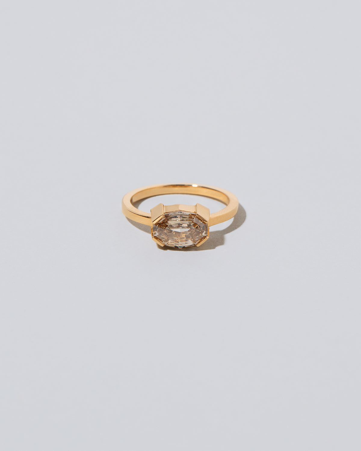 Metis Ring on light color background.