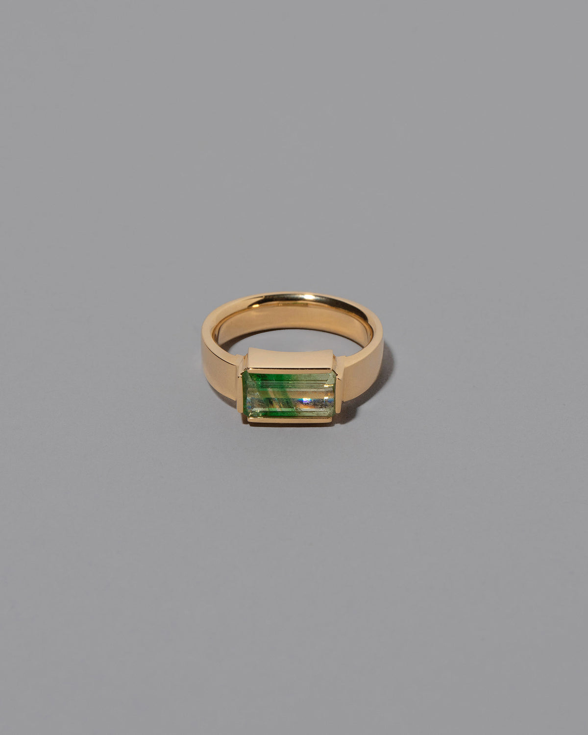 Gather Ring on grey color background.