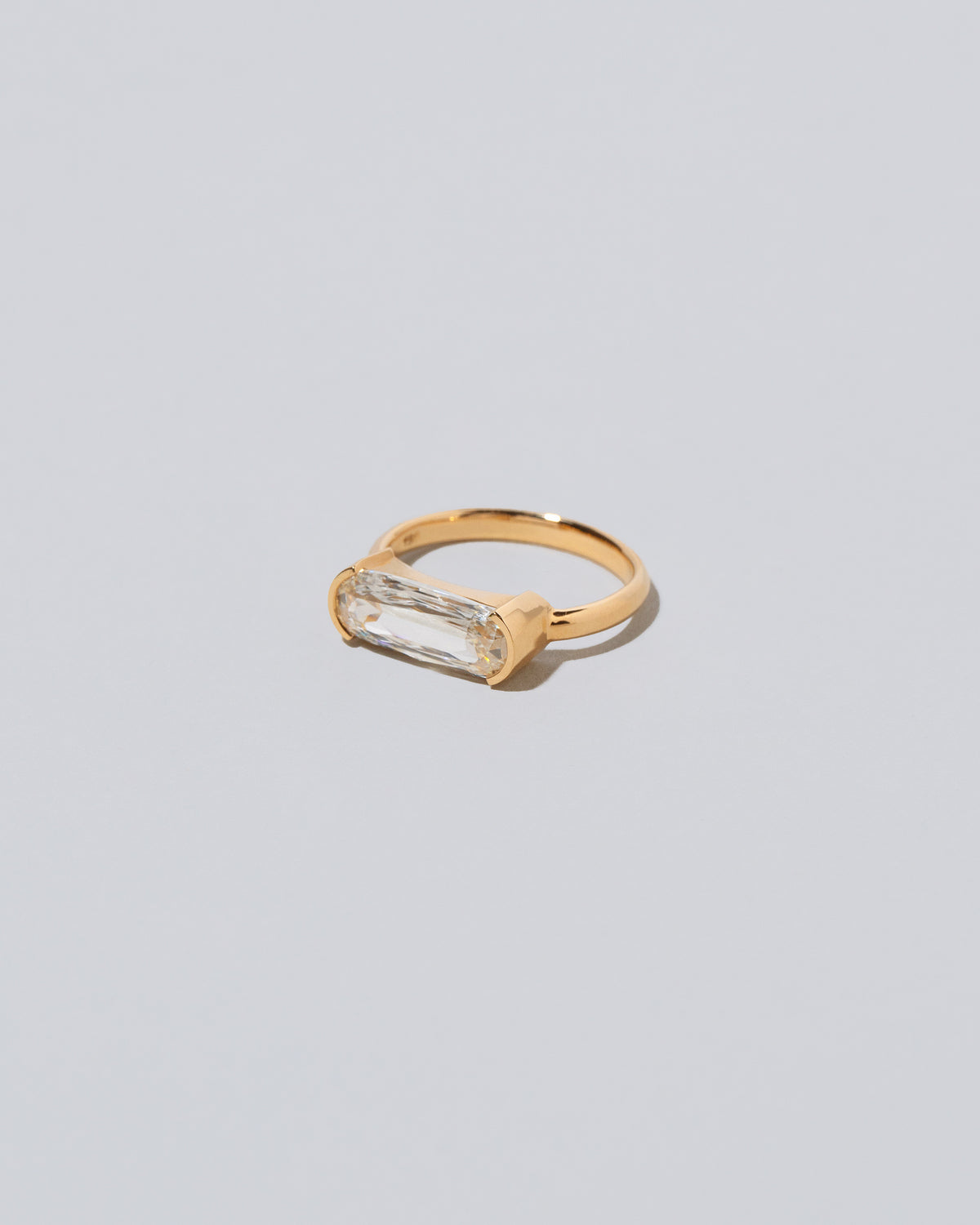 View from the side of the Elara Ring on light color background.