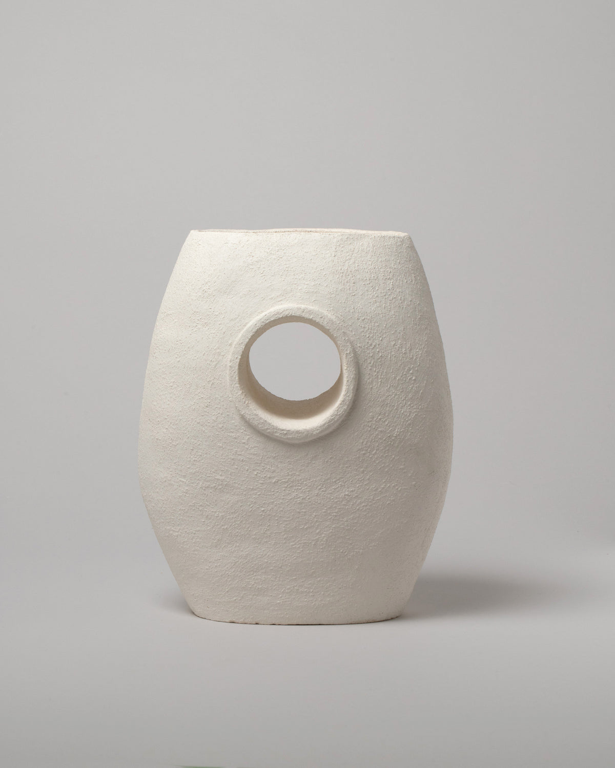 Stephanie Phillips Single Barrel Vessel on light color background.