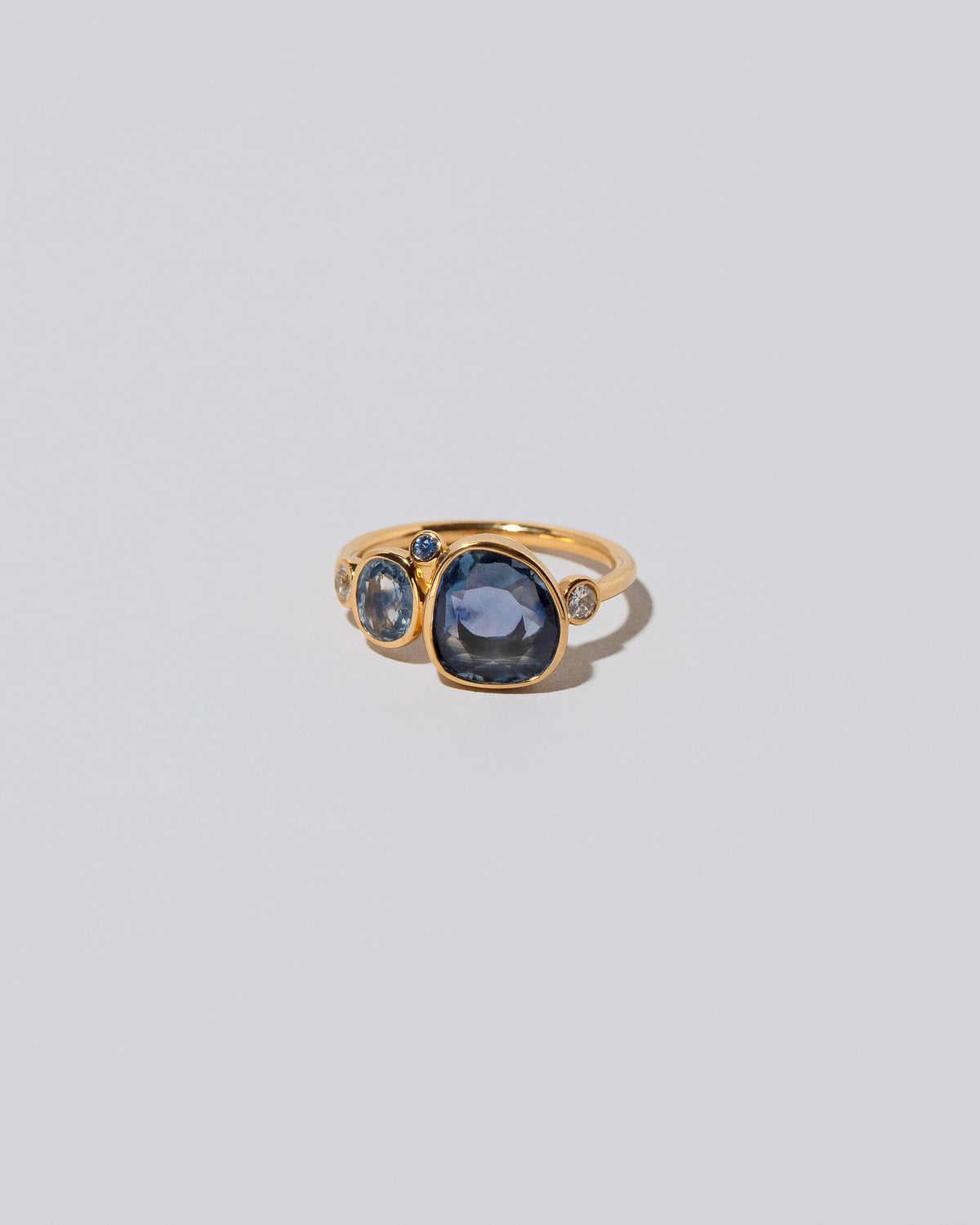 Oceania Ring on light color background.