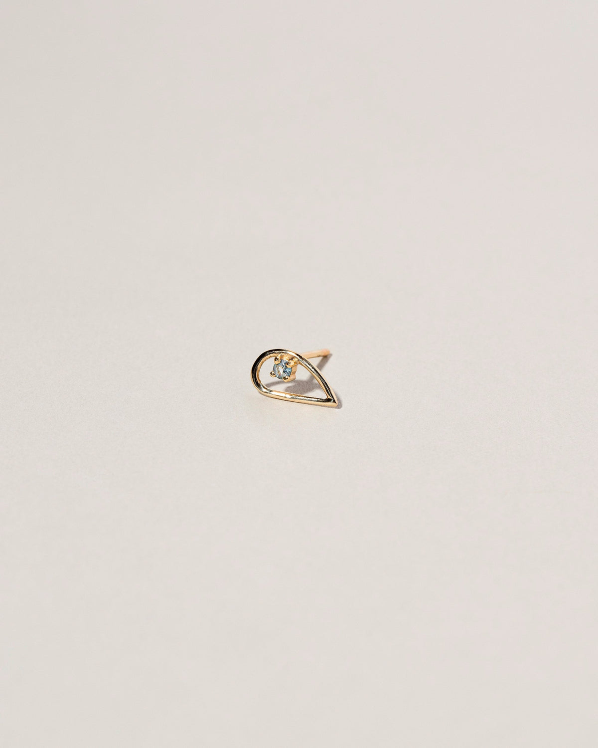  Sun Drop Single Stud on light color background.