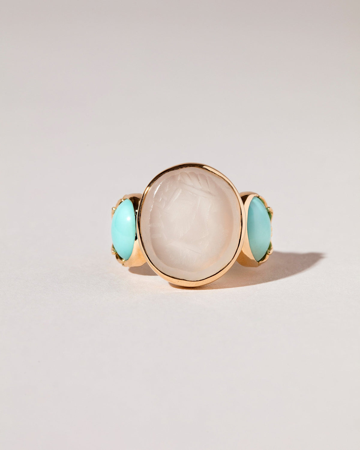 Manifestation Ring on light color background.