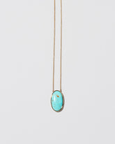 Turquoise Necklace on light color background.