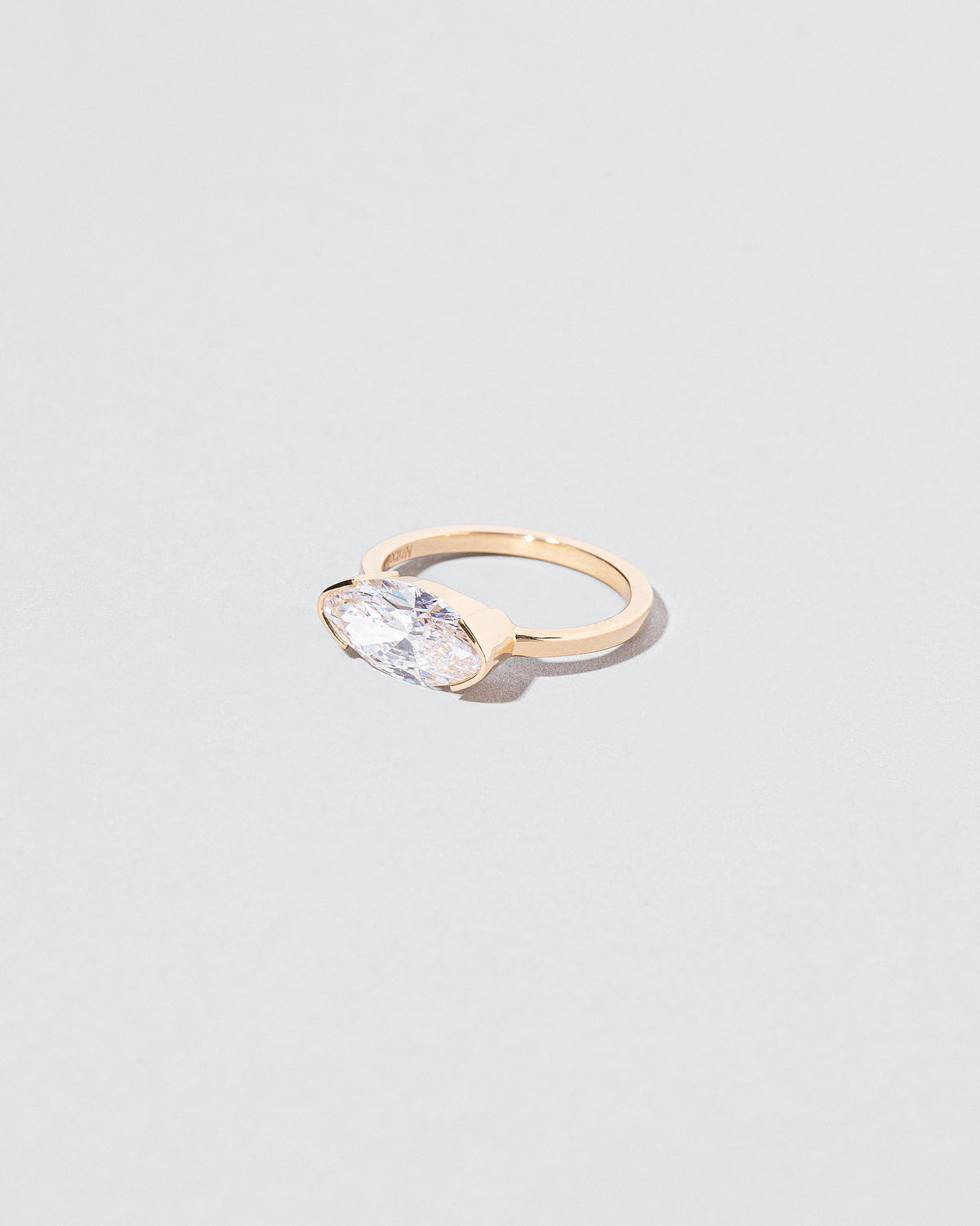 View from the side of the Symmetry Ring on light color background.