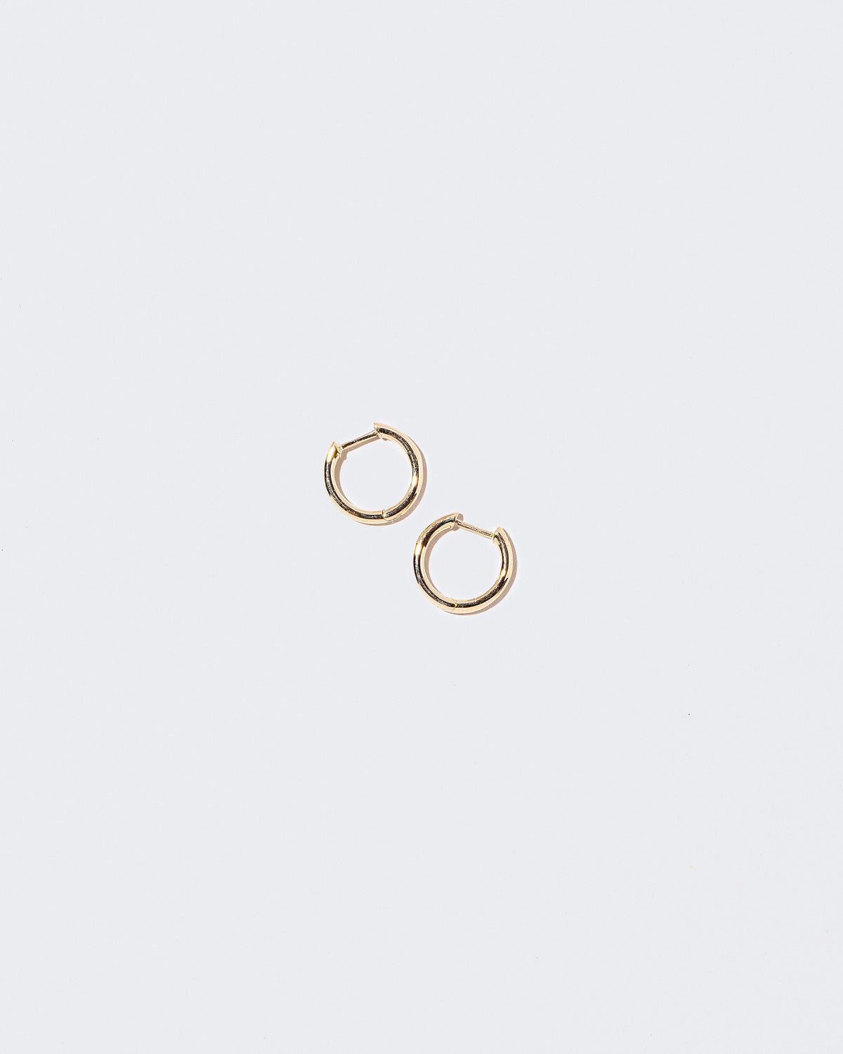 Gold Classic Solid Snack Hoops on light color background.