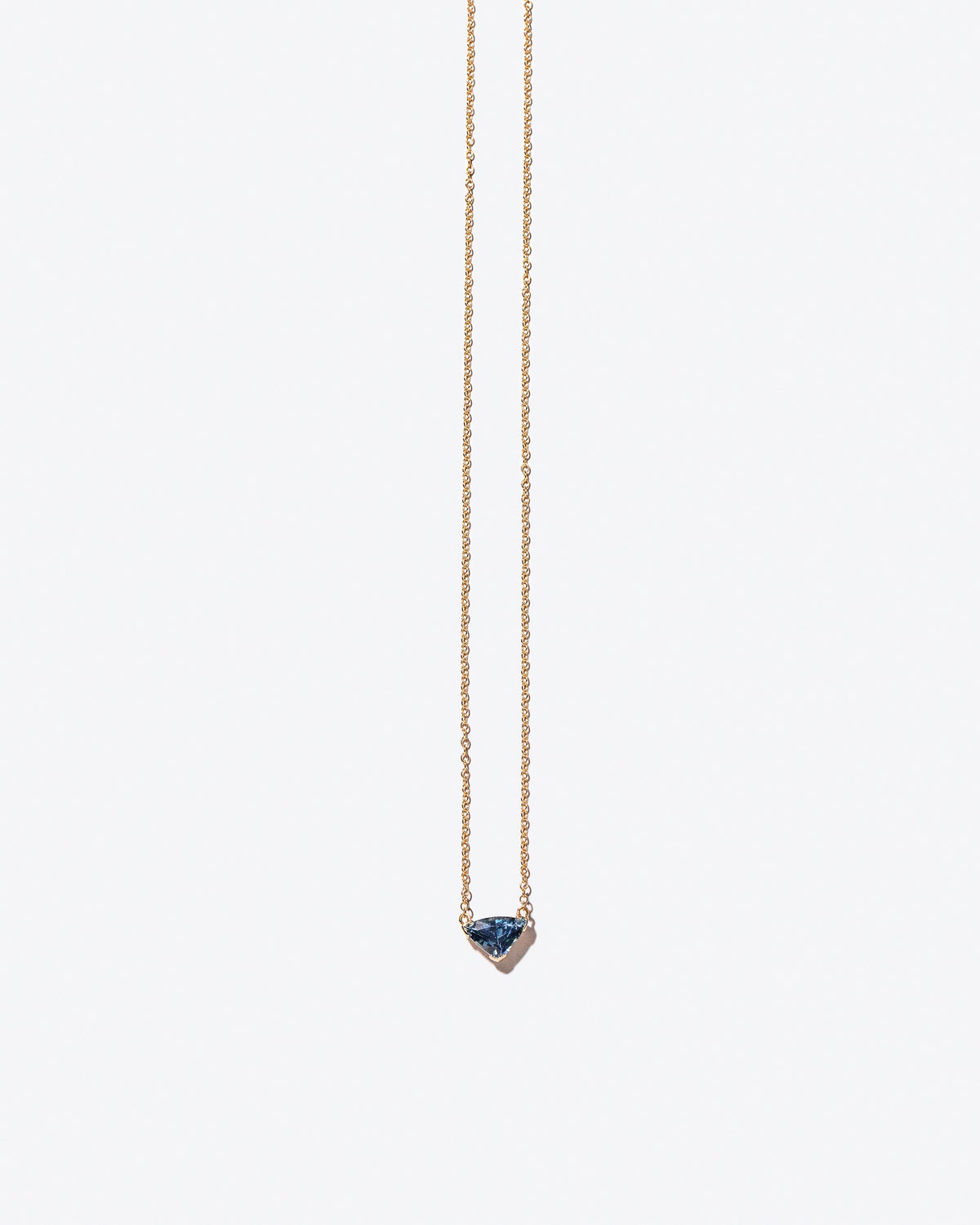 Product photo of Gil Necklace on a light color background 