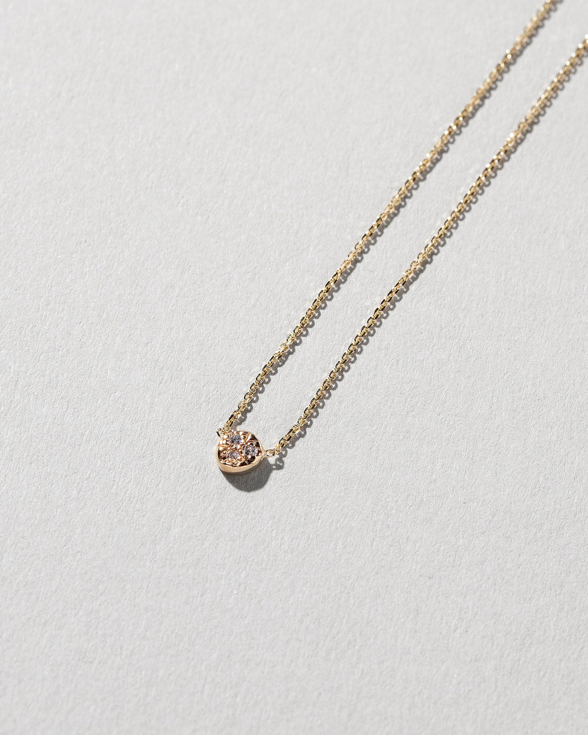  Circle Necklace on light color background.