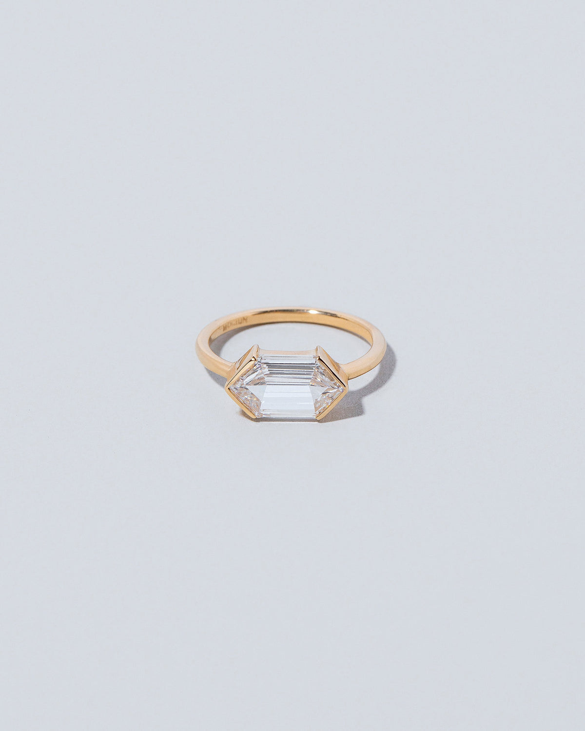 Headstrong Ring on light color background.