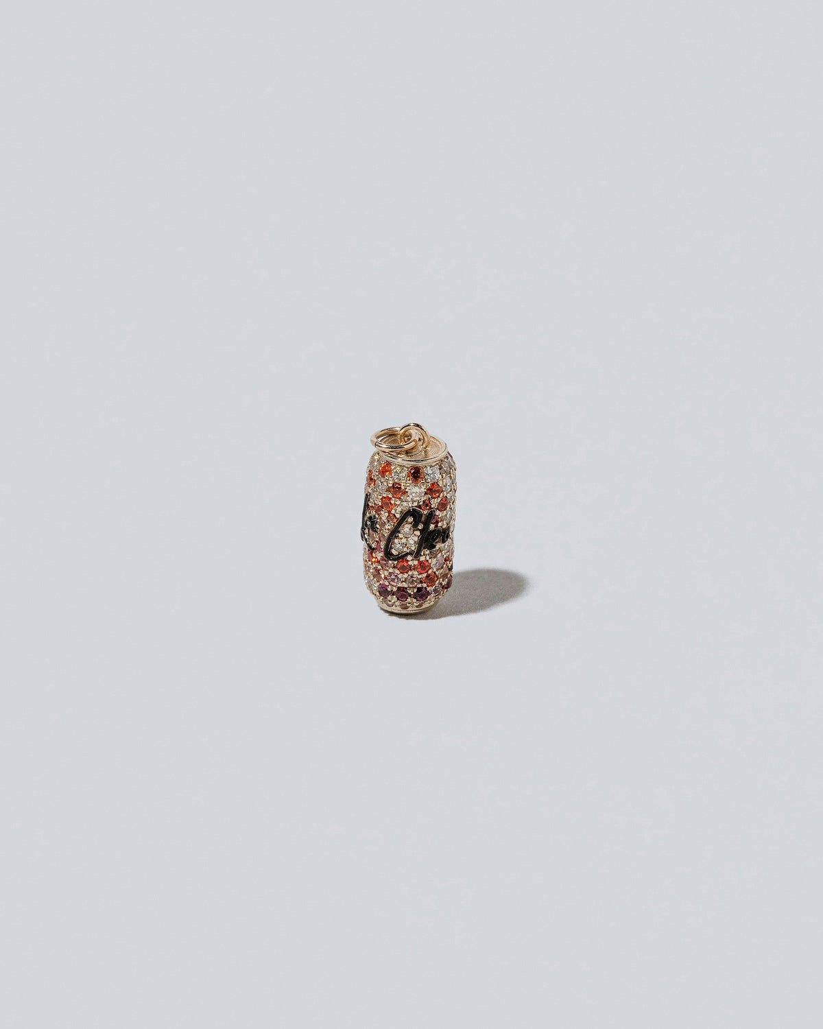Aluminum Can Charm - La Cleos on light color background.