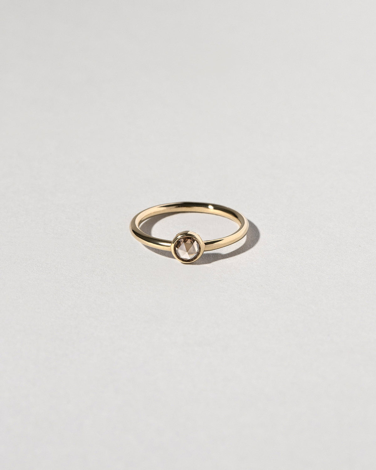 Rose Cut Champagne Diamond Ring on light color background.