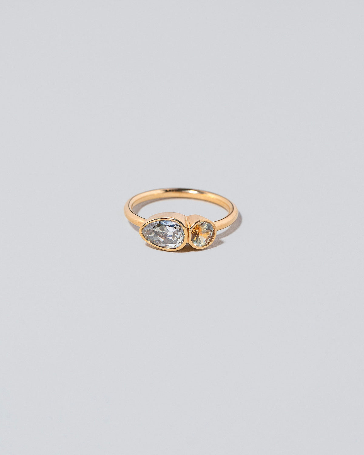  Assal Ring on light color background.