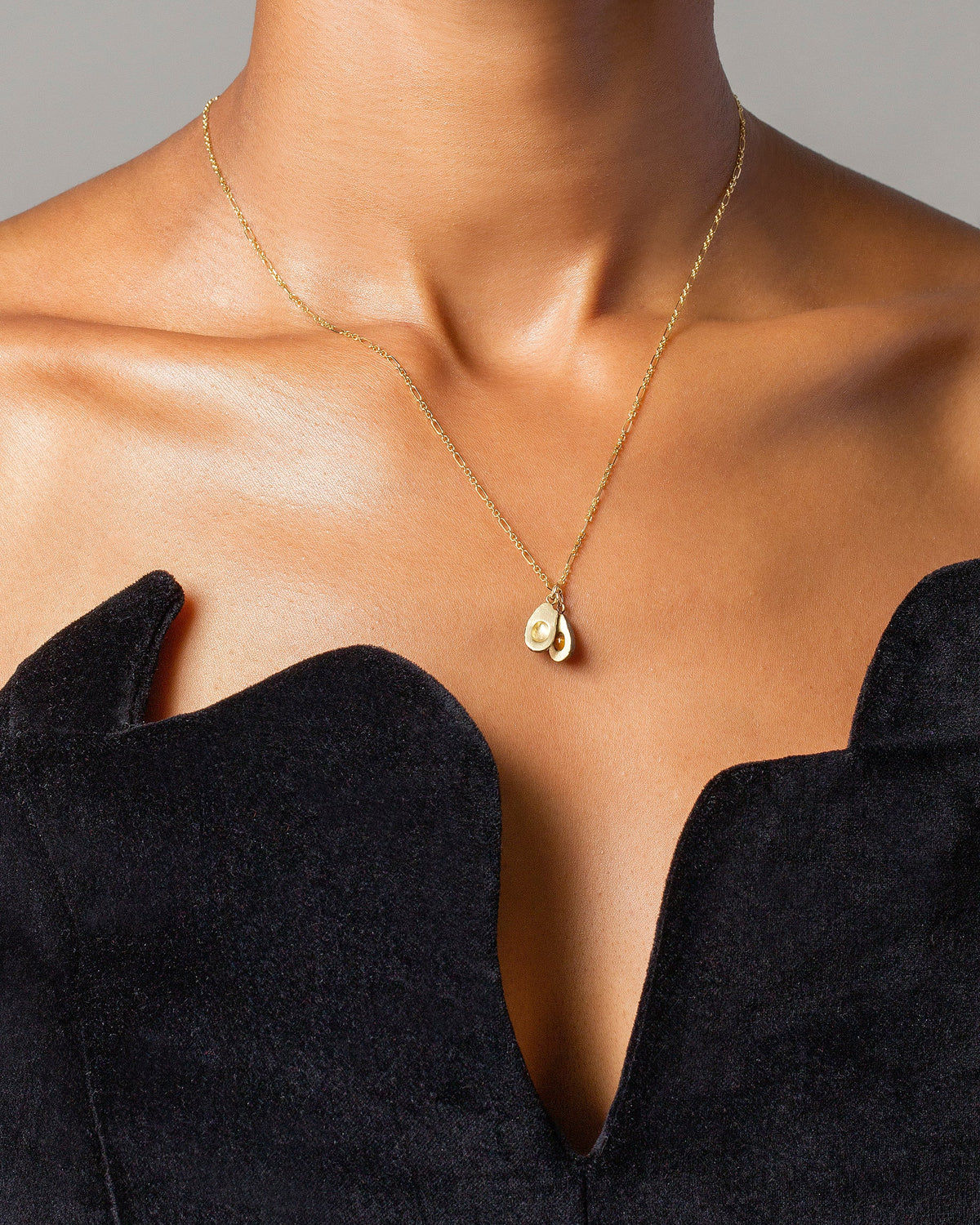 Halved Avocado Charms and Abacus Chain Necklace on model.