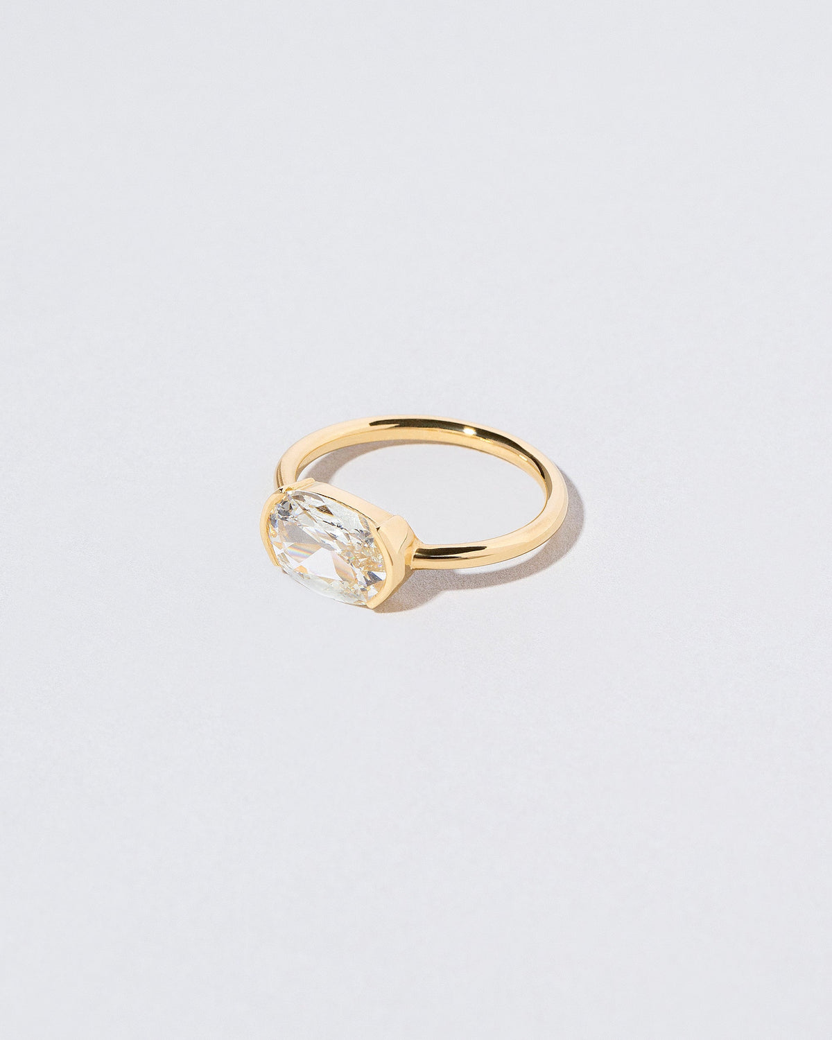 View from the side of the Staircase Ring on light color background.