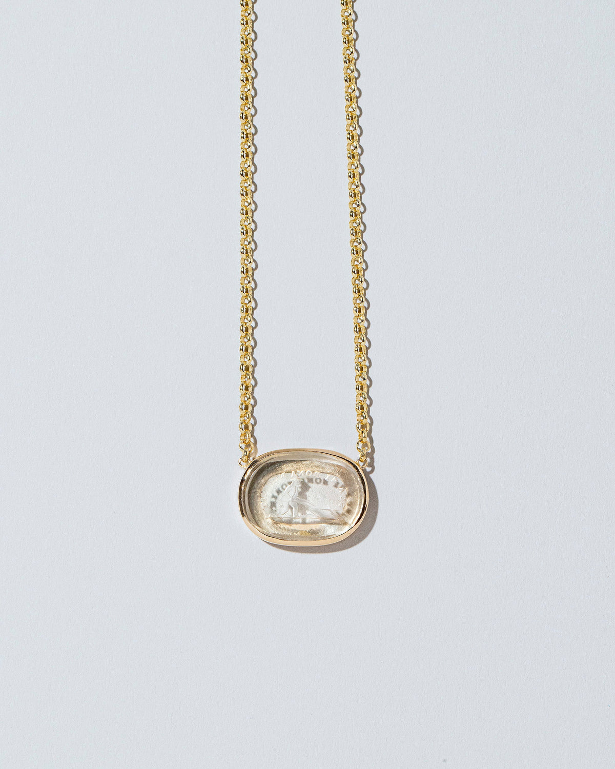  Simplicity Intaglio Seal Necklace on light color background.
