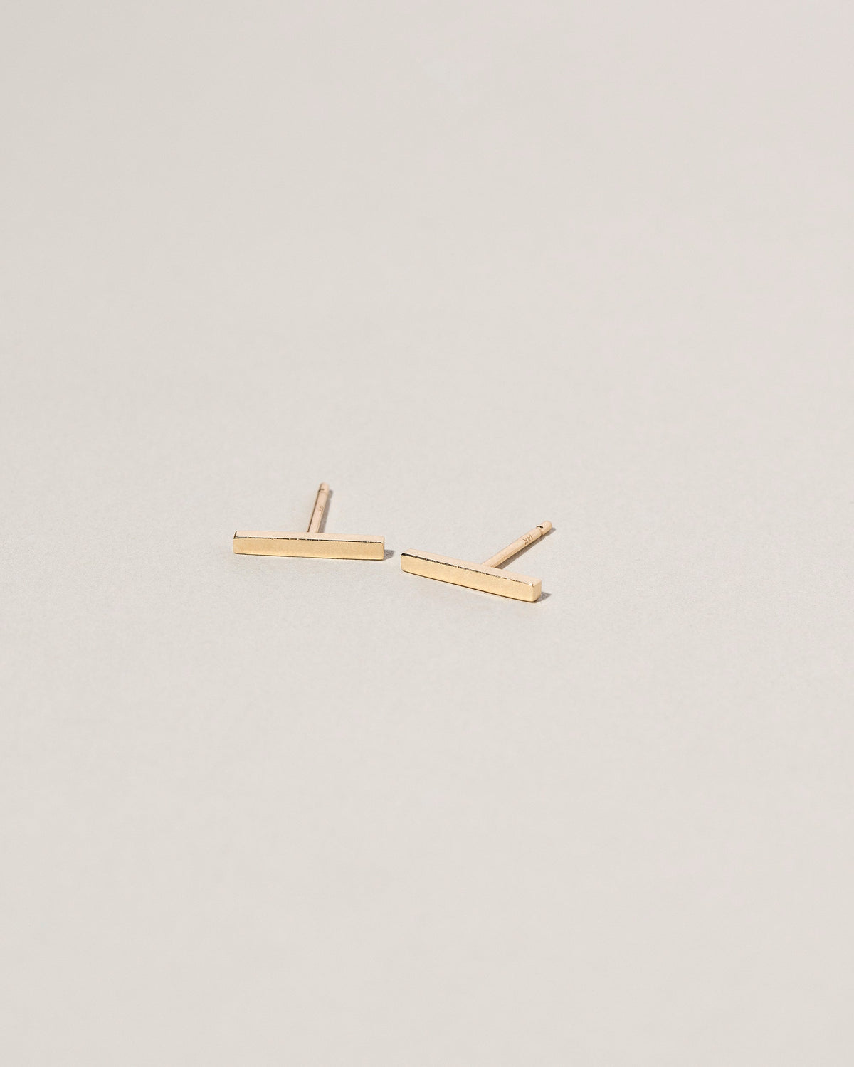  Stick Studs on light color background.