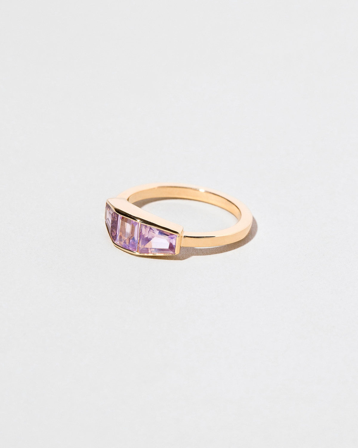  Dhatu Ring on light color background.