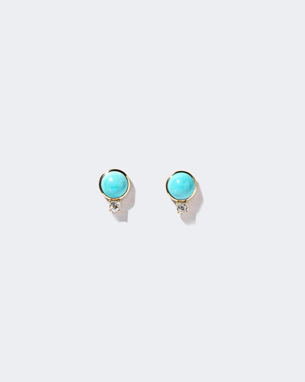  In-Between Earrings on light color background.