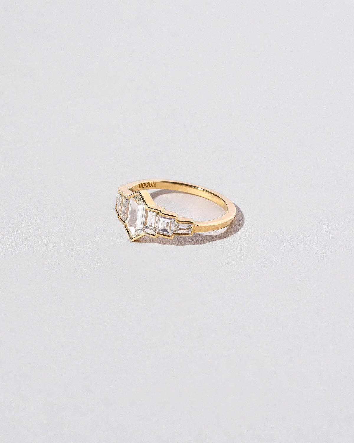  Septet Ring on light color background.