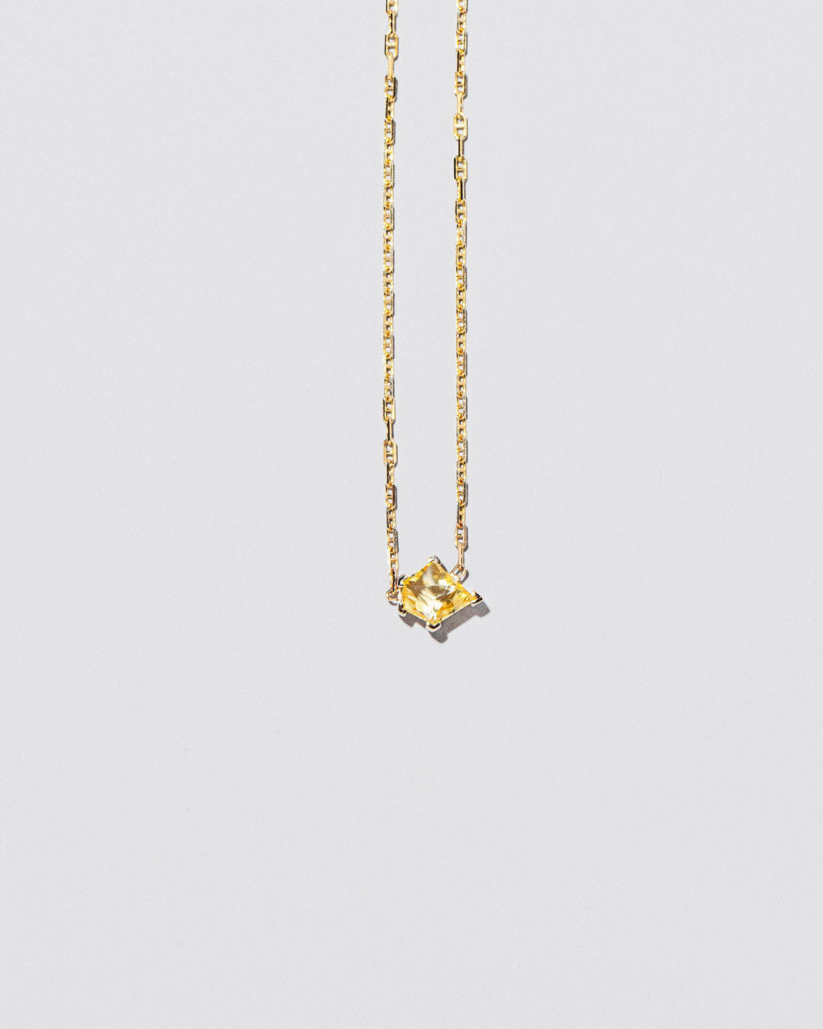  Be Good Necklace on light color background.