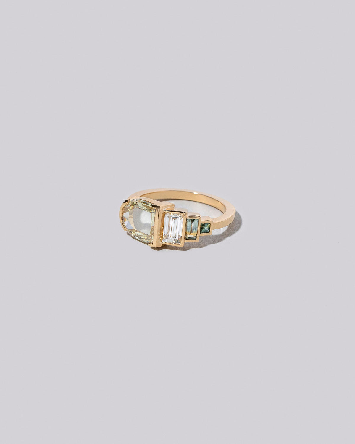 Albertine Ring on light colored background.