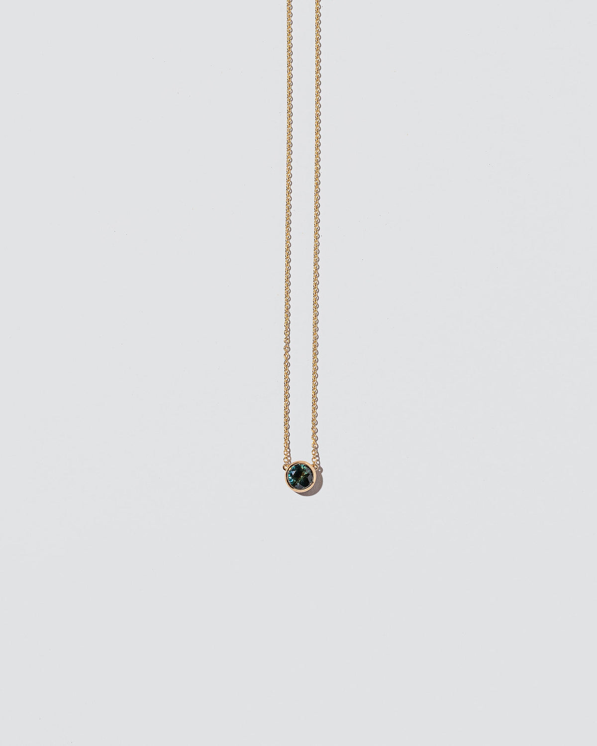  Triadic Necklace on light color background.