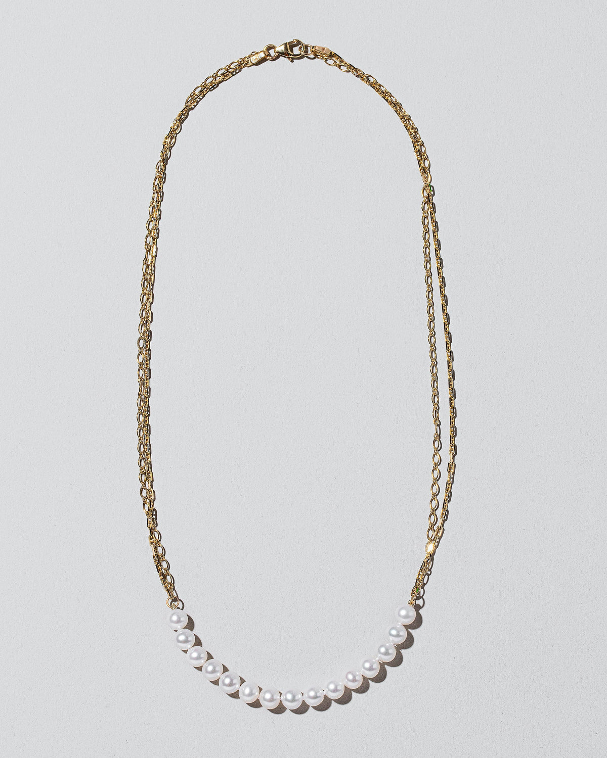  Pearls of Wisdom Necklace on light color background.