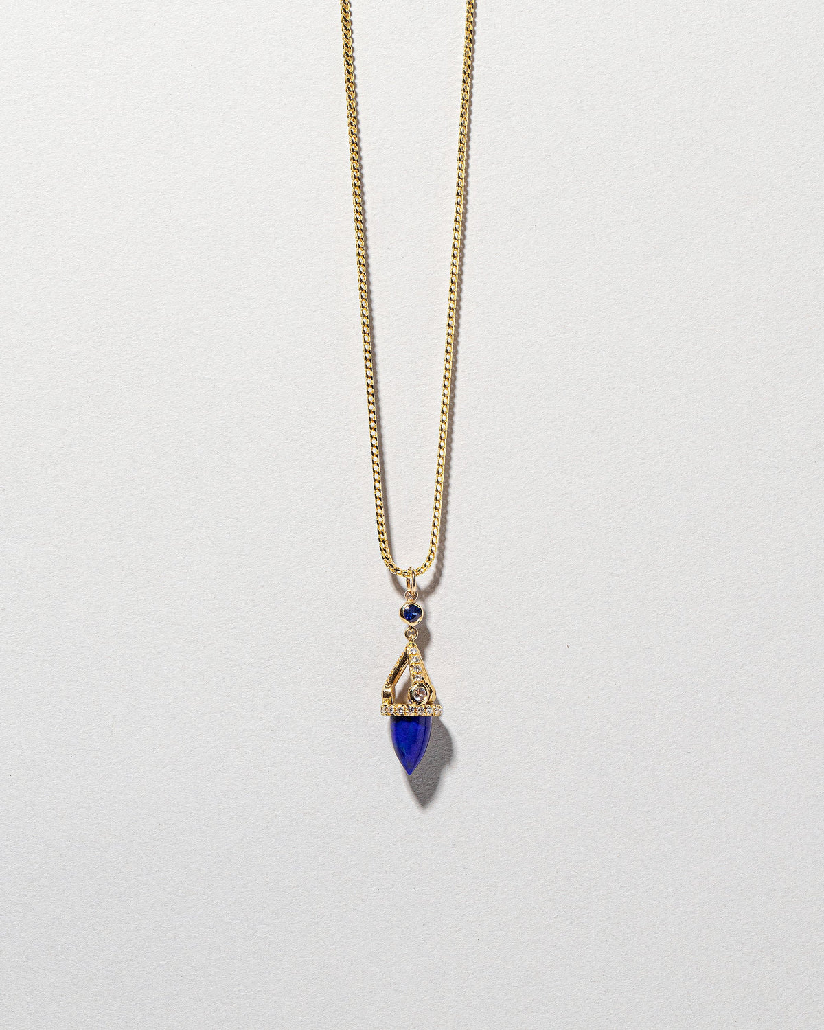  Lapis Drop Pendant on light color background.