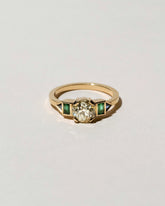  Five Stone Ring on light color background.