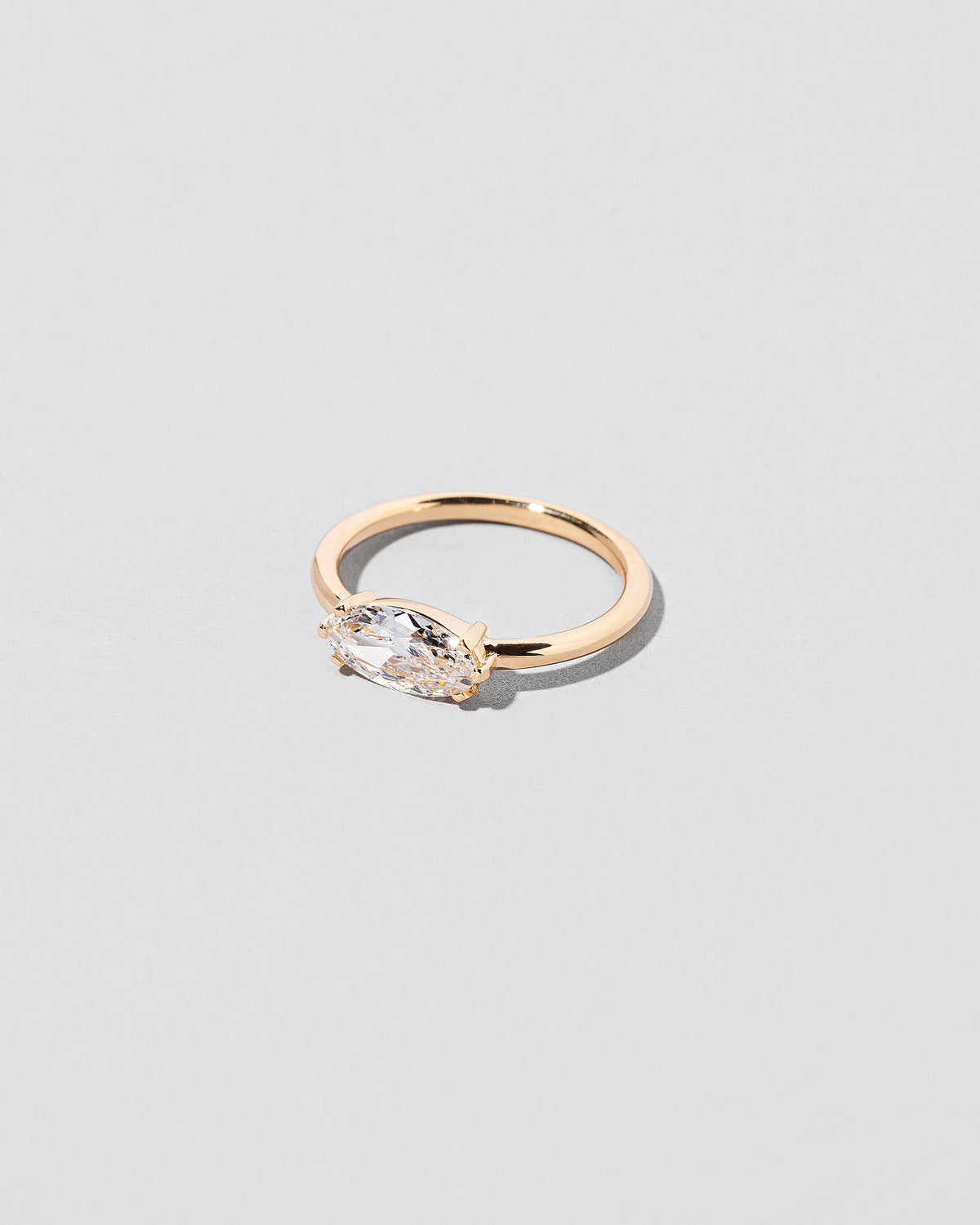  Elixer Ring on light color background.