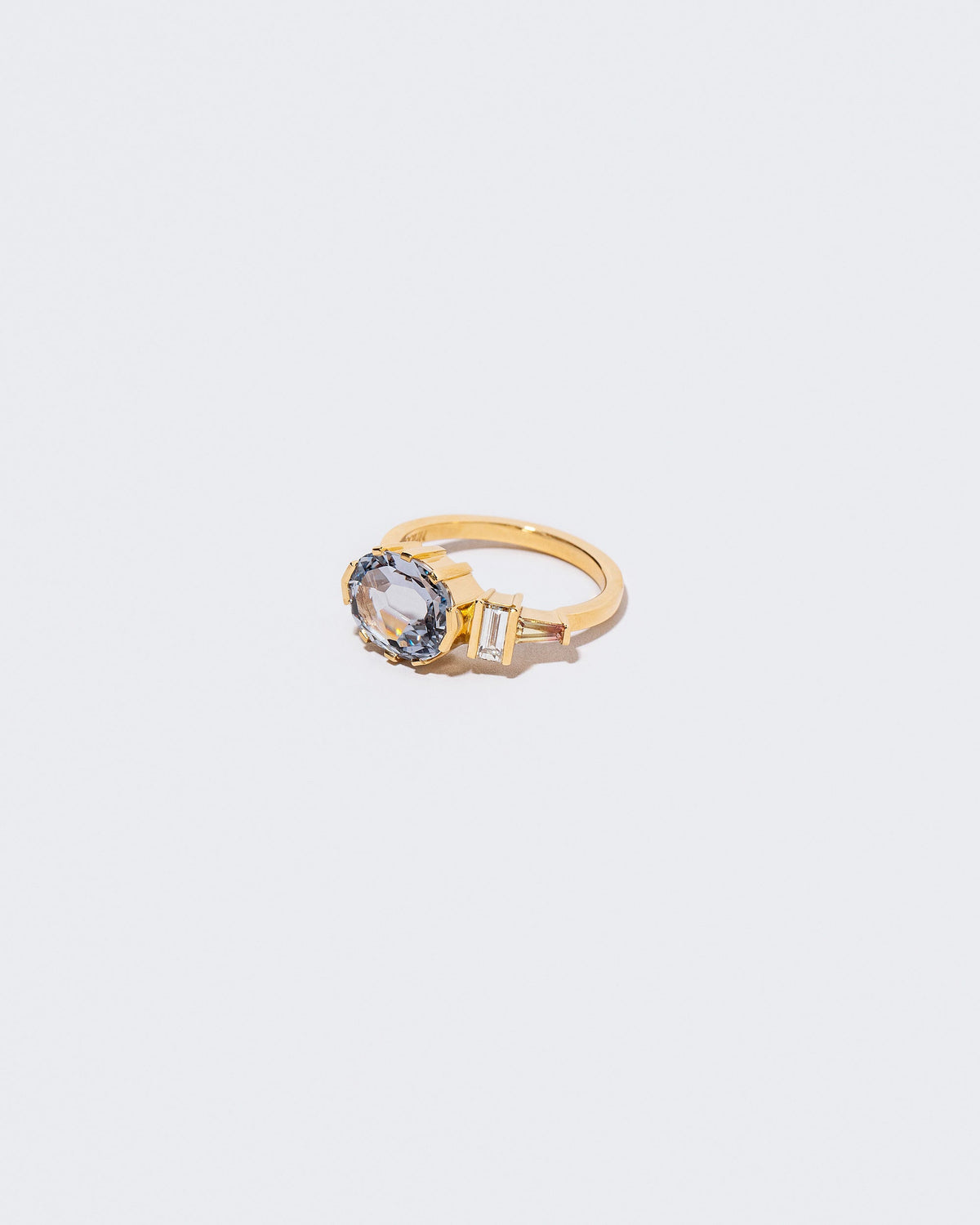 Side view of Heliotrope Ring on white background