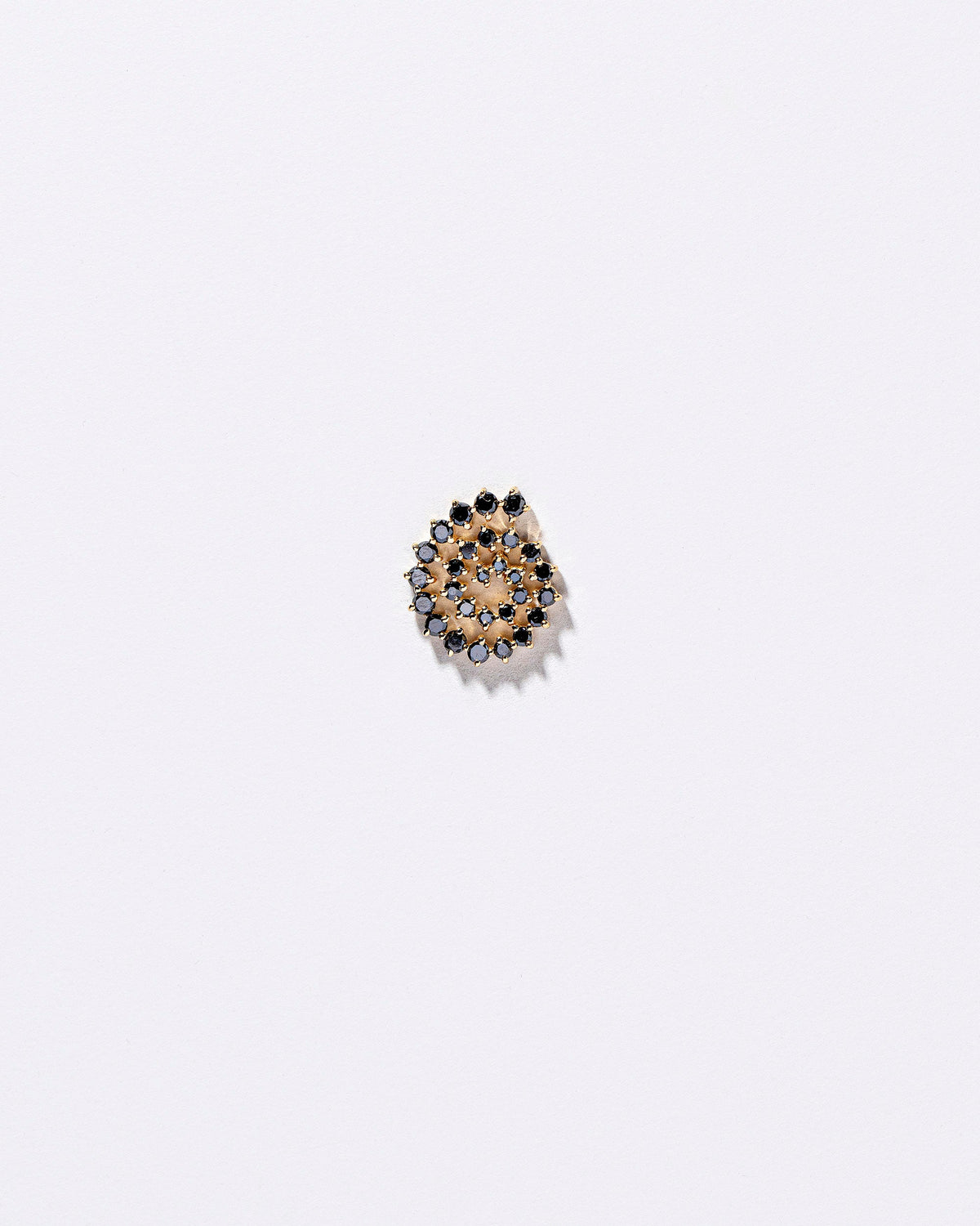 Full Black Diamond Right Spiral Stud Earring Single on light color background.