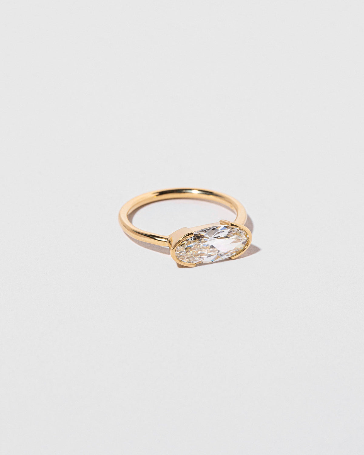 View from the side of the Eternal Ring on light color background.