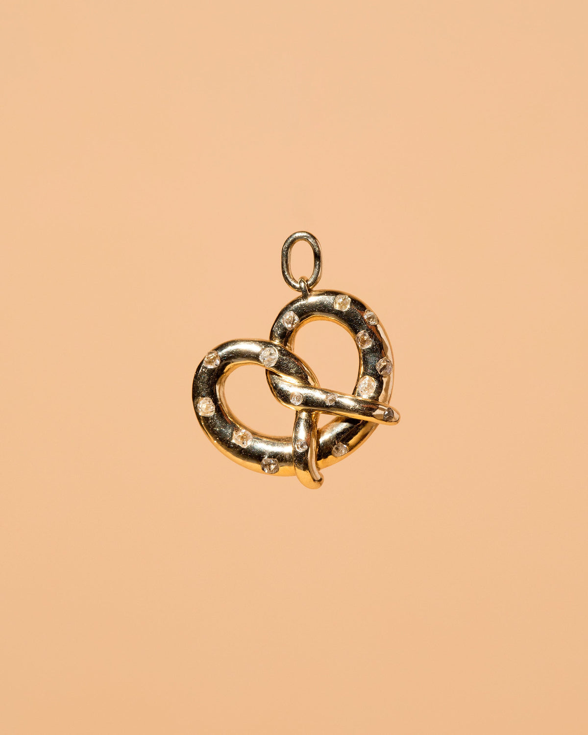  Salted Pretzel Charm on light color background.